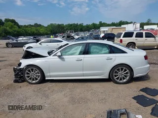 2018 Audi A6 Premium Plus z VIN WAUG3AFC5JN045370, wystawiony jako IAAI lot #42342165 z przebiegiem 107 705 mil mil oraz . Historia ofert i sprzedaży dostępna na DreamBid. Obrazek 15.