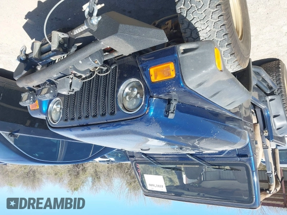 2000 Jeep Wrangler Sport with VIN 1J4FA49S0YP770943, listed as a IAAI auction lot 41817600 with 165,379 mi miles and . Bid and sale history available at DreamBid. Image 6.