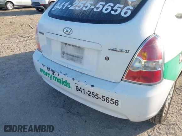 2007 Hyundai Accent GS with VIN KMHCM36C17U001726, listed as a IAAI auction lot 41962105 with 138,952 mi miles. Bid and sale history available at carsss.com. Image 16.