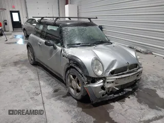 2002 MINI Hardtop with VIN WMWRC33422TC37296, listed as a IAAI auction lot 41385046 with 107,663 mi miles and . Bid and sale history available at DreamBid. Image 1.
