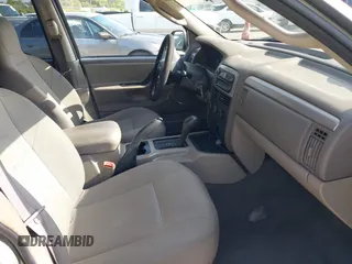 2004 Jeep Grand Cherokee Laredo with VIN 1J4GX48N24C334983, listed as a IAAI auction lot 42522088 with 169,793 mi miles and . Bid and sale history available at DreamBid. Image 5.