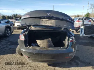 2018 Tesla Model 3 Long Range Battery with VIN 5YJ3E1EB4JF184814, listed as a Copart auction lot 88073115 with Not Provided miles and Salvage Title. Bid and sale history available at DreamBid. Image 6.