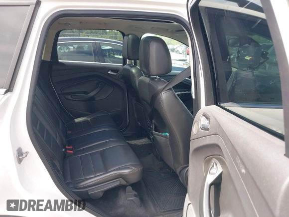 2013 Ford Escape SEL with VIN 1FMCU9HX1DUA51248, listed as a IAAI auction lot 42185187 with 123,845 mi miles and . Bid and sale history available at DreamBid. Image 8.