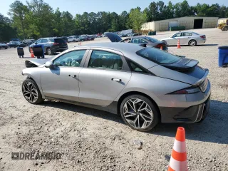 2023 Hyundai Ioniq 6 Preferred z VIN KMHM34AC0PA030141, wystawiony jako Copart lot #57694704 z przebiegiem 7051 mil mil oraz Szkoda całkowita • Salvage title. Historia ofert i sprzedaży dostępna na DreamBid. Obrazek 2.