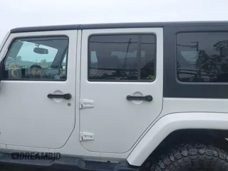 2015 Jeep Wrangler Unlimited Sahara с VIN 1C4BJWEG1FL506393, выставлен на аукционе IAAI как лот 42326900 с пробегом 100 538 миль миль и . История ставок и продаж доступна на DreamBid. Изображение 14.