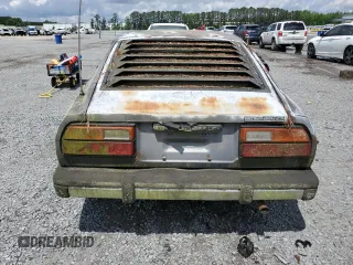 1981 Datsun 280ZX z VIN JN1HZ04SDBX265650, wystawiony jako Copart lot #56589245 z przebiegiem 147 572 mil mil oraz Nie do naprawy • Non repairable. Historia ofert i sprzedaży dostępna na DreamBid. Obrazek 6.