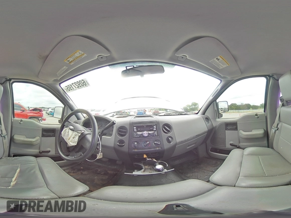 2007 Ford F-150 XL with VIN 1FTRF12W97KC13119, listed as a Copart auction lot 60927195 with 208,316 mi miles and Salvage title. Bid and sale history available at DreamBid. Image 14.