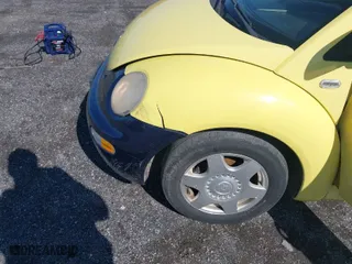 1999 Volkswagen New Beetle GLS with VIN 3VWCC21C1XM415115, listed as a IAAI auction lot 41933992 with 193,653 mi miles. Bid and sale history available at carsss.com. Image 6.