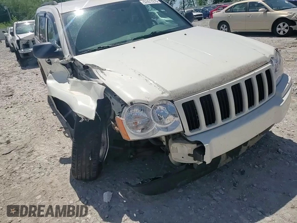 2005 Jeep Grand Cherokee Laredo with VIN 1J4GR48K05C625144, listed as a Copart auction lot 57477275 with 167,654 mi miles and Salvage title. Bid and sale history available at DreamBid. Image 14.