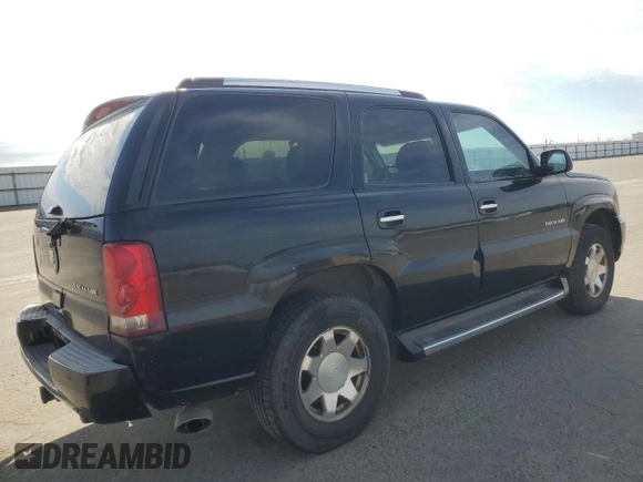 2003 Cadillac Escalade z VIN 1GYEK63N93R143629, wystawiony jako Copart lot #50333955 z przebiegiem 102 828 mil mil oraz Szkoda całkowita • Salvage title. Historia ofert i sprzedaży dostępna na DreamBid. Obrazek 3.
