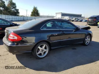 2003 Mercedes-Benz CLK 500 with VIN WDBTJ75JX3F039229, listed as a Copart auction lot 77006714 with 111,617 mi miles and Salvage Title. Bid and sale history available at DreamBid. Image 3.