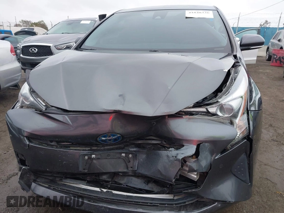 2018 Toyota Prius Two with VIN JTDKBRFUXJ3591956, listed as a IAAI auction lot 41848336 with 62,560 mi miles and . Bid and sale history available at DreamBid. Image 12.