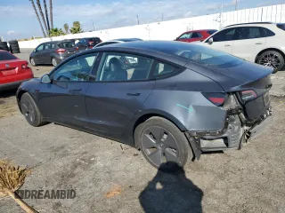 2023 Tesla Model 3 with VIN 5YJ3E1EA3PF541593, listed as a Copart auction lot 43926455 with 26,593 mi miles and Salvage title. Bid and sale history available at DreamBid. Image 2.