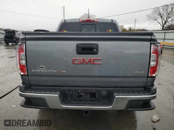 2018 GMC Canyon 2WD SLE with VIN 1GTG5CEN5J1216265, listed as a Copart auction lot 81245954 with 77,464 mi miles and Salvage Title. Bid and sale history available at carsss.com. Image 6.