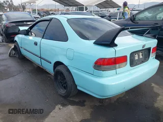 1998 Honda Civic HX with VIN 1HGEJ7127WL127977, listed as a IAAI auction lot 41230187 with 182,000 mi miles. Bid and sale history available at carsss.com. Image 3.
