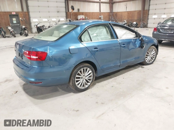 2015 Volkswagen Jetta SE z VIN 3VWD07AJ2FM315225, wystawiony jako IAAI lot #41929278 z przebiegiem 127 240 mil mil oraz . Historia ofert i sprzedaży dostępna na DreamBid. Obrazek 4.