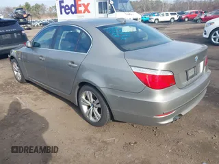2010 BMW 5 Series 528i xDrive with VIN WBANV1C50AC157738, listed as a IAAI auction lot 41879863 with 170,826 mi miles and . Bid and sale history available at carsss.com. Image 3.