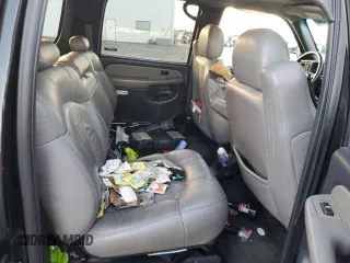 2001 Chevrolet Suburban LS z VIN 3GNFK16T91G221421, wystawiony jako Copart lot #87094634 z przebiegiem 186 977 mil mil oraz Szkoda całkowita • Salvage title. Historia ofert i sprzedaży dostępna na DreamBid. Obrazek 11.