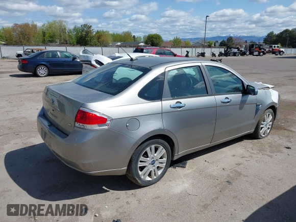 2008 Ford Focus SE z VIN 1FAHP35N78WZ94676, wystawiony jako IAAI lot #42094725 z przebiegiem 106 353 mil mil oraz . Historia ofert i sprzedaży dostępna na DreamBid. Obrazek 4.