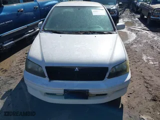 2003 Mitsubishi Lancer LS with VIN JA3AJ36E73U054672, listed as a IAAI auction lot 42002271 with 263,568 mi miles. Bid and sale history available at carsss.com. Image 6.