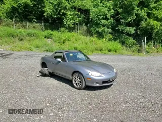2002 Mazda MX-5 Miata Cloth z VIN JM1NB353520224582, wystawiony jako Copart lot #63669835 z przebiegiem 88 455 mil mil oraz Szkoda całkowita • Salvage title. Historia ofert i sprzedaży dostępna na DreamBid. Obrazek 13.