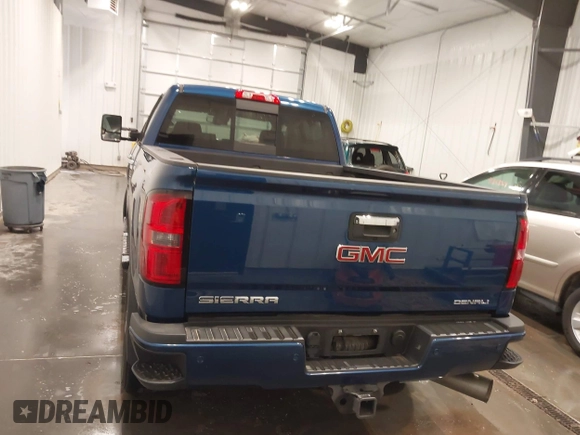 2015 GMC Sierra 2500HD Denali z VIN 1GT120E86FF655301, wystawiony jako IAAI lot #41965001 z przebiegiem 74 136 mil mil oraz . Historia ofert i sprzedaży dostępna na DreamBid. Obrazek 17.