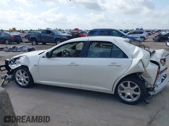 2005 Cadillac STS with VIN 1G6DC67A850172166, listed as a IAAI auction lot 39667014 with 64,676 mi miles and . Bid and sale history available at DreamBid. Image 14.