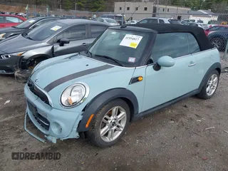 2013 MINI Convertible z VIN WMWZN3C53DT135427, wystawiony jako IAAI lot #41954817 z przebiegiem 57 029 mil mil oraz . Historia ofert i sprzedaży dostępna na DreamBid. Obrazek 2.
