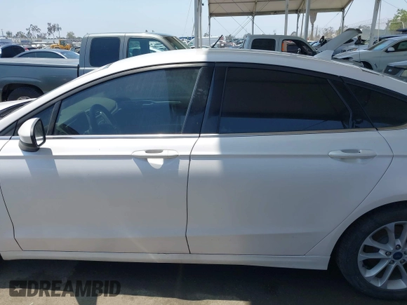 2020 Ford Fusion SE with VIN 3FA6P0LU9LR227928, listed as a IAAI auction lot 42445186 with 59,431 mi miles and . Bid and sale history available at DreamBid. Image 14.