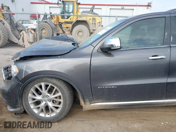 2014 Dodge Durango Citadel with VIN 1C4RDHEG2EC381324, listed as a IAAI auction lot 42021611 with 104,178 mi miles and . Bid and sale history available at DreamBid. Image 18.