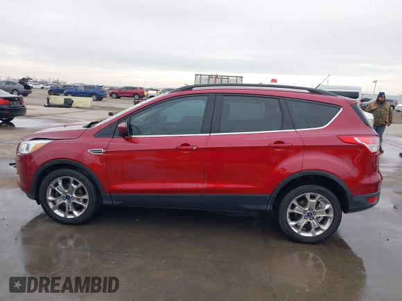 2015 Ford Escape SE with VIN 1FMCU0GXXFUC74470, listed as a IAAI auction lot 41419669 with 94,107 mi miles. Bid and sale history available at carsss.com. Image 14.