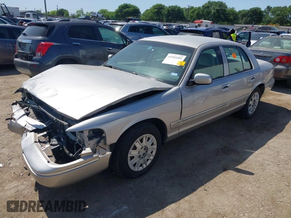 2005 Mercury Grand Marquis GS with VIN 2MEFM74W05X653375, listed as a IAAI auction lot 41995502 with 200,083 mi miles and . Bid and sale history available at DreamBid. Image 17.