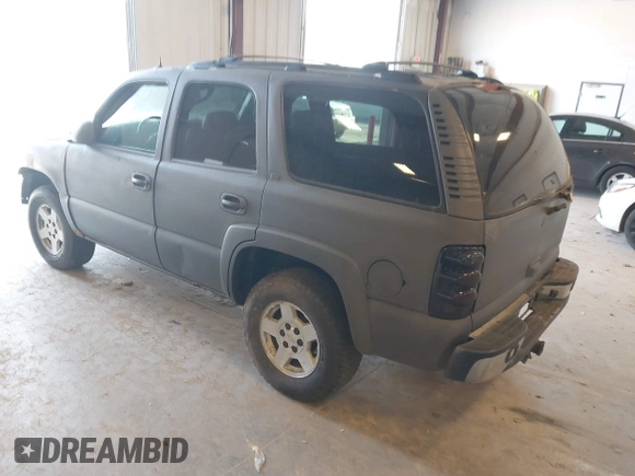 2004 Chevrolet Tahoe LS with VIN 1GNEK13ZX4J204098, listed as a IAAI auction lot 42143393 with 293,548 mi miles. Bid and sale history available at carsss.com. Image 3.
