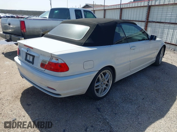 2001 BMW 3 Series 330Ci with VIN WBABS53401JU88051, listed as a IAAI auction lot 41704279 with 196,223 mi miles. Bid and sale history available at carsss.com. Image 4.