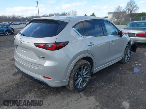 2024 Mazda CX-5 2.5 S Premium Package with VIN JM3KFBDL5R0465272, listed as a IAAI auction lot 41959823 with 12,777 mi miles. Bid and sale history available at carsss.com. Image 4.