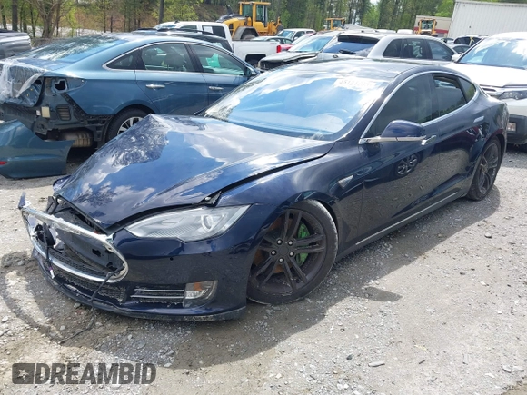 2014 Tesla Model S 60 with VIN 5YJSA1H15EFP43884, listed as a IAAI auction lot 41993180 with 78,305 mi miles and . Bid and sale history available at DreamBid. Image 16.