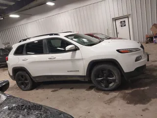 2016 Jeep Cherokee Latitude with VIN 1C4PJMCB0GW226093, listed as a IAAI auction lot 41683652 with 130,168 mi miles and . Bid and sale history available at DreamBid. Image 13.