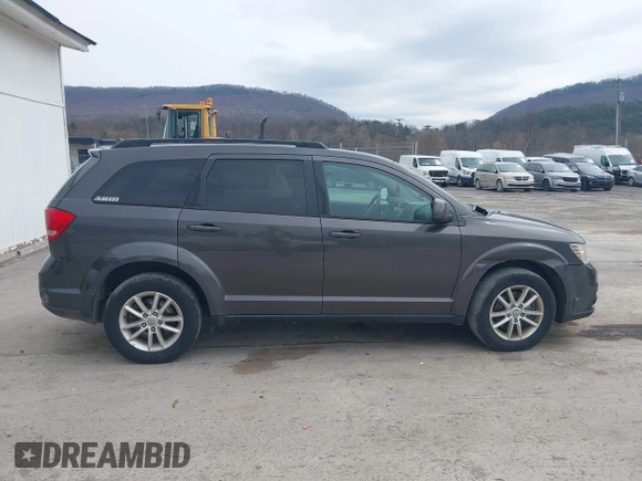 2014 Dodge Journey SXT z VIN 3C4PDDBG2ET161528, wystawiony jako IAAI lot #41932649 z przebiegiem 161 597 mil mil oraz . Historia ofert i sprzedaży dostępna na DreamBid. Obrazek 13.