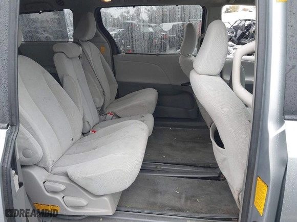 2014 Toyota Sienna LE AAS with VIN 5TDKK3DC1ES488954, listed as a IAAI auction lot 41557423 with 144,031 mi miles. Bid and sale history available at carsss.com. Image 8.