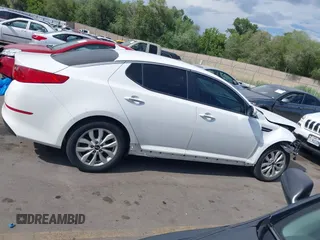2015 Kia Optima LX with VIN KNAGM4A77F5637238, listed as a IAAI auction lot 42372825 with 139,099 mi miles and . Bid and sale history available at DreamBid. Image 14.