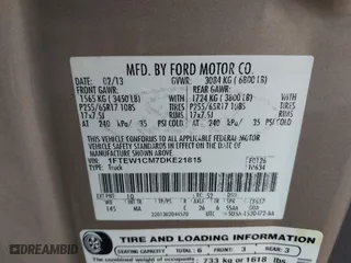 2013 Ford F-150 XL with VIN 1FTEW1CM7DKE21815, listed as a IAAI auction lot 41570720 with 186,398 mi miles. Bid and sale history available at carsss.com. Image 9.