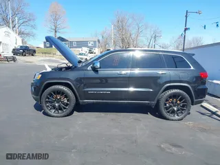 2015 Jeep Grand Cherokee Limited with VIN 1C4RJFBM1FC113082, listed as a IAAI auction lot 41710144 with 1 mi miles. Bid and sale history available at carsss.com. Image 14.