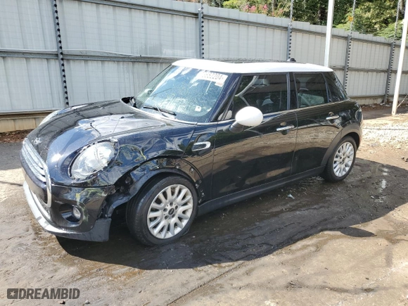 2015 MINI Cooper Hardtop 4 Door with VIN WMWXS5C5XFT830325, listed as a Copart auction lot 73652204 with 119,848 mi miles and Salvage Title. Bid and sale history available at carsss.com. Image 1.