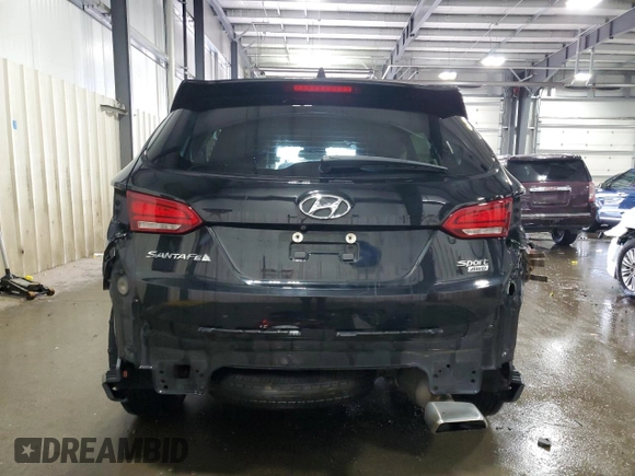 2017 Hyundai Santa Fe 2.4L z VIN 5NMZUDLB7HH027319, wystawiony jako Copart lot #58259575 z przebiegiem 114 812 mil mil oraz Szkoda całkowita • Salvage title. Historia ofert i sprzedaży dostępna na DreamBid. Obrazek 6.