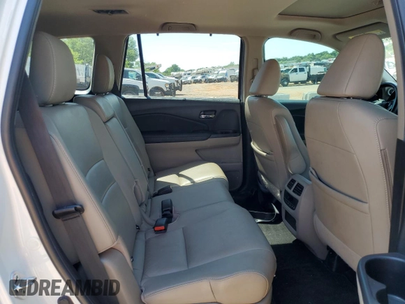 2021 Honda Pilot EX-L with VIN 5FNYF6H52MB096077, listed as a Copart auction lot 56970435 with 59,749 mi miles and Salvage title. Bid and sale history available at DreamBid. Image 11.