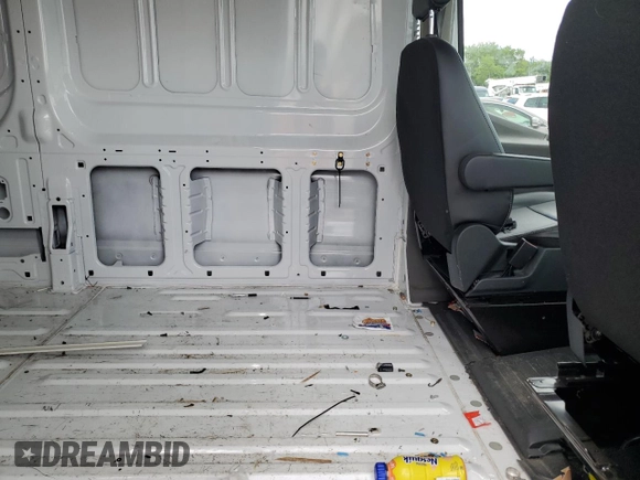 2023 Ford Transit Cargo with VIN 1FTBR1C83PKA24362, listed as a Copart auction lot 58766595 with 7,047 mi miles and Salvage title. Bid and sale history available at DreamBid. Image 11.