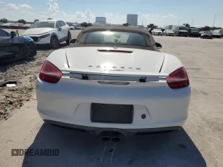 2014 Porsche Boxster z VIN WP0CA2A80ES121133, wystawiony jako Copart lot #73422534 z przebiegiem 52 623 mil mil oraz Nie do naprawy • Non repairable. Historia ofert i sprzedaży dostępna na DreamBid. Obrazek 6.