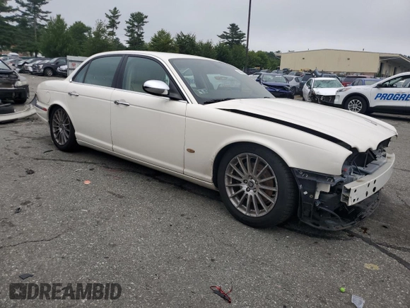 2007 Jaguar XJ with VIN SAJWA71B67SH12726, listed as a Copart auction lot 64840394 with 71,363 mi miles and Salvage Title. Bid and sale history available at carsss.com. Image 4.