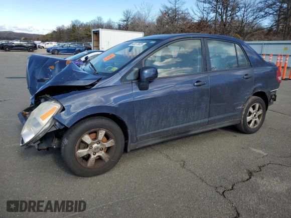 2009 Nissan Versa 1.8 S with VIN 3N1BC11E69L441683, listed as a Copart auction lot 43377925 with 111,958 mi miles and Salvage Title. Bid and sale history available at carsss.com. Image 1.