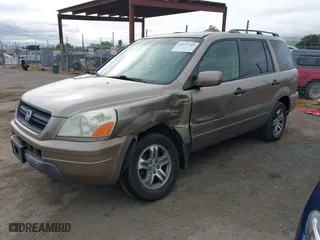 2004 Honda Pilot EX with VIN 2HKYF18594H523176, listed as a IAAI auction lot 41937743 with 310,344 mi miles. Bid and sale history available at carsss.com. Image 18.